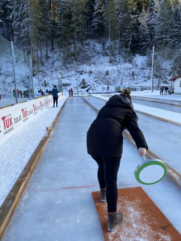 curling on a winter holiday