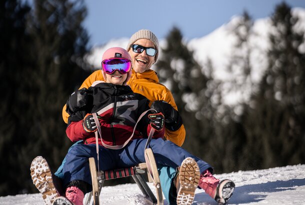 sledging with child in the Zillertal