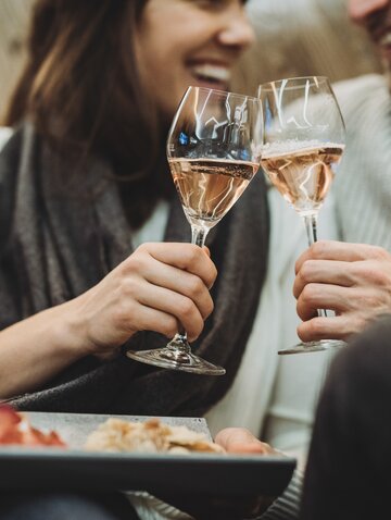 couple with sparkling wine hotel Tuxerhof