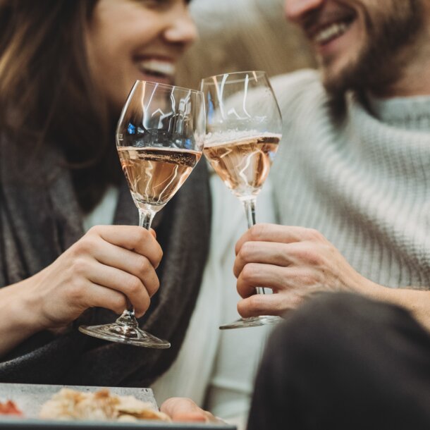 couple with sparkling wine hotel Tuxerhof