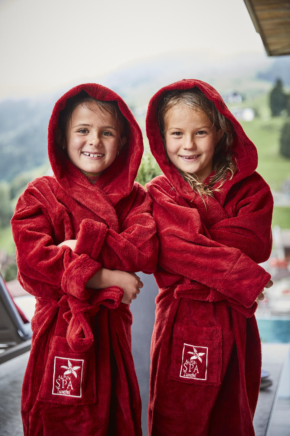 children with bathrobe wellness holiday Tuxerhof