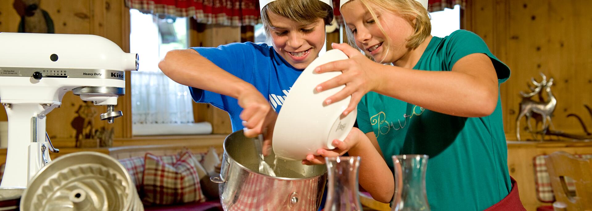 children baking in the family hotel