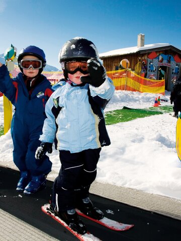children in the Tux ski course